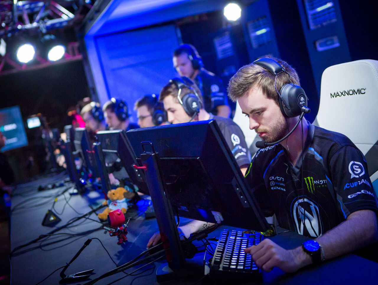 Player in a headset locked in on a tactical FPS match